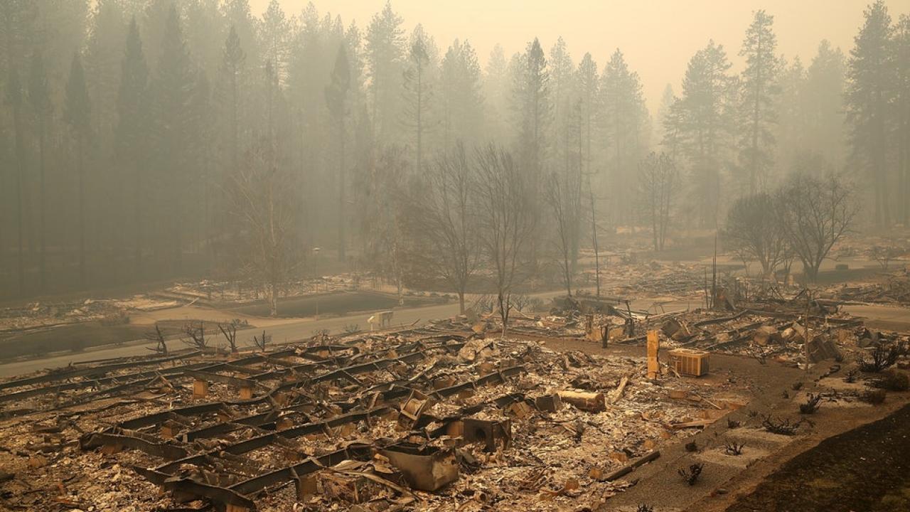 Justin Sullivan/Getty Images News/Getty Images Image: after-effects of the air quality from California's Camp fire depicting lingering smoke and charred ground.